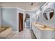 Bathroom featuring double vanities and a soaking tub at 205 Olde Oak Dr, Jonesboro, GA 30238