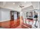 A spacious living room featuring hardwood floors and built in shelves at 205 Olde Oak Dr, Jonesboro, GA 30238