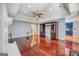 Spacious living room features hardwood floors, fireplace, and custom built-in entertainment center at 205 Olde Oak Dr, Jonesboro, GA 30238