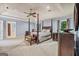 This main bedroom has carpet floors, wood furniture, and blue walls at 205 Olde Oak Dr, Jonesboro, GA 30238