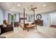 This is a canopy bed in the main bedroom that has carpet floors and light blue walls at 205 Olde Oak Dr, Jonesboro, GA 30238