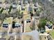 Aerial view highlighting property lines and its position within the Locust Grove neighborhood, revealing lot size at 321 Harris Ave, Locust Grove, GA 30248