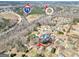 Aerial shot showcasing a home's location within a neighborhood with nearby amenities and easy highway access at 321 Harris Ave, Locust Grove, GA 30248