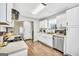 Bright kitchen features stainless steel appliances, abundant cabinetry, and a layout ready for modern living at 321 Harris Ave, Locust Grove, GA 30248