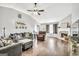 Inviting living room boasts high ceilings and views of the fireplace, offering comfort and style at 321 Harris Ave, Locust Grove, GA 30248