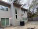 This lovely home features a contemporary exterior with light siding, plentiful windows, and a fenced yard at 7560 Taylor Rd # 1, Riverdale, GA 30274