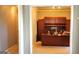 Office featuring a large wooden desk, storage cabinets, and warm neutral tones at 1622 Brentwood Se Xing, Conyers, GA 30013