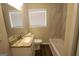 Bathroom featuring granite vanity and tiled shower-tub combo at 3578 Sherbrooke Sw Way, Atlanta, GA 30331