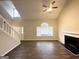 Inviting living room featuring high ceilings, a fireplace, laminate flooring and natural light at 3228 Rivermist Cv, Decatur, GA 30034