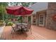 Outdoor deck features an umbrella, patio furniture and offers a great outdoor dining space at 107 Rolling Grn, Peachtree City, GA 30269