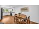 Open dining area adjacent to the kitchen, featuring hardwood floors and a modern dining set at 2694 Benjamin E Mays Sw Dr, Atlanta, GA 30311