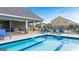 Community pool with shaded lounge areas and neighborhood views at 1704 Goodwin Dr, Hampton, GA 30228