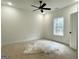 Bedroom features a ceiling fan, a single window and closet at 4601 Parkwood Rd, Social Circle, GA 30025