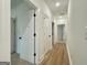 Hallway with doorways at 4601 Parkwood Rd, Social Circle, GA 30025