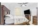 Bedroom featuring a bed, TV on a dresser, ceiling fan, and vaulted ceilings at 1090 Crown River Pkwy, Mcdonough, GA 30252