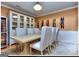 Elegant dining room with wine storage and built-in display cabinet, perfect for entertaining at 1090 Crown River Pkwy, Mcdonough, GA 30252