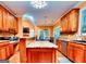 Spacious kitchen with a central island cooktop and eat in kitchen at 1090 Crown River Pkwy, Mcdonough, GA 30252