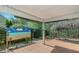 Spacious covered patio with a painted outdoor decor and tile flooring at 100 Hugh Dr, Covington, GA 30016