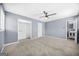 Large bedroom features closet, ceiling fan, and ensuite bathroom at 2511 Due West Nw Cir, Kennesaw, GA 30152