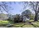 Spacious back deck with a view of the large grassy backyard at 689 Hardin Rd, Temple, GA 30179