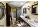 Bathroom with double vanity sink and shower-tub combination at 689 Hardin Rd, Temple, GA 30179