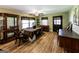 Inviting dining room with hardwood floors, traditional furnishings, and abundant natural light at 689 Hardin Rd, Temple, GA 30179