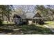Exterior view of a charming brick home with mature landscaping and a cozy atmosphere at 689 Hardin Rd, Temple, GA 30179