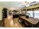 Spacious eat-in kitchen features a breakfast bar, stainless appliances, and wood flooring at 689 Hardin Rd, Temple, GA 30179