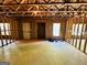 Unfinished basement with framed walls, concrete floor, and natural light from windows at 2481 Weatherstone Cir, Conyers, GA 30094