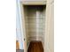 Walk-in closet with installed wire shelving for optimal organization and storage solutions at 2481 Weatherstone Cir, Conyers, GA 30094