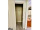 A walk-in closet with a single wire shelf offers practical storage solutions inside the home at 2481 Weatherstone Cir, Conyers, GA 30094