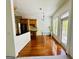 Light filled dining area with access to the kitchen and backyard at 2481 Weatherstone Cir, Conyers, GA 30094
