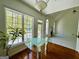 Bright open living room with large windows, fireplace, and deck access for outdoor enjoyment at 2481 Weatherstone Cir, Conyers, GA 30094