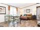 Comfortable living room with stylish furniture, hardwood floors and natural lighting at 54 Holly Dr, Carrollton, GA 30116