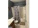 Bathroom features a shower and toilet at 888 Shadow Lakes Dr, Lithonia, GA 30058
