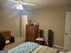 Bedroom featuring a ceiling fan, and wood furniture at 888 Shadow Lakes Dr, Lithonia, GA 30058