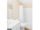 Clean bathroom featuring tub, vanity, and toilet with wood floors at 7112 Brookview Way, Riverdale, GA 30274