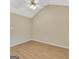Bright bedroom with wood floors and ceiling fan at 7112 Brookview Way, Riverdale, GA 30274
