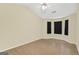 Bright bedroom with wood floors, ceiling fan and natural light from window at 7112 Brookview Way, Riverdale, GA 30274