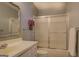 Bathroom featuring a tub with shower, vanity, decorative mirror, and a white toilet at 2340 Rolling Acres Sw Dr, Conyers, GA 30094
