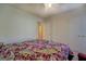 Bedroom featuring a bed with patterned bedspread and closet at 2340 Rolling Acres Sw Dr, Conyers, GA 30094