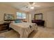 Bedroom features plush carpet, ceiling fan and neutral walls at 2340 Rolling Acres Sw Dr, Conyers, GA 30094