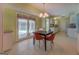 Bright dining area with a view to the screened porch at 2340 Rolling Acres Sw Dr, Conyers, GA 30094