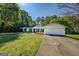 The exterior of this well-kept home includes a spacious two-car garage and manicured landscaping at 2340 Rolling Acres Sw Dr, Conyers, GA 30094