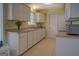 Functional kitchen featuring ample counter space, cabinetry and modern appliances at 2340 Rolling Acres Sw Dr, Conyers, GA 30094