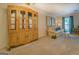 Elegant living room featuring a comfortable sofa, decorative pillows, and tasteful furnishings at 2340 Rolling Acres Sw Dr, Conyers, GA 30094
