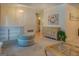 Open-concept living area with stylish furnishings and neutral decor for a welcoming atmosphere at 2340 Rolling Acres Sw Dr, Conyers, GA 30094