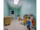 ' playroom featuring tile floors and storage for toys at 2340 Rolling Acres Sw Dr, Conyers, GA 30094