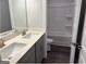Bathroom with double sink vanity, grey cabinets, quartz countertops, and a tub/shower combo at 3383 Milan Ct # 4 Plapprox Sqft 1, Douglasville, GA 30135