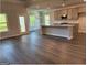 Open floor plan features the living room and kitchen with an eat-in area and hardwood flooring at 3383 Milan Ct # 4 Plapprox Sqft 1, Douglasville, GA 30135